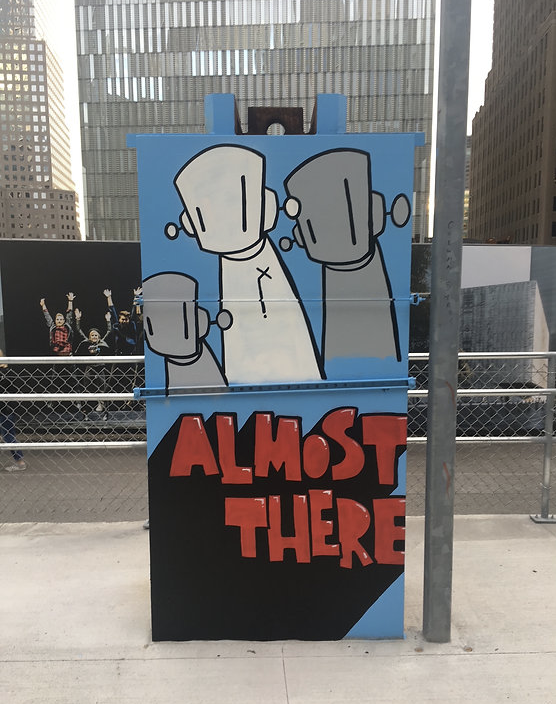 Chris RWK street painting of a lone robot on a New York City corner